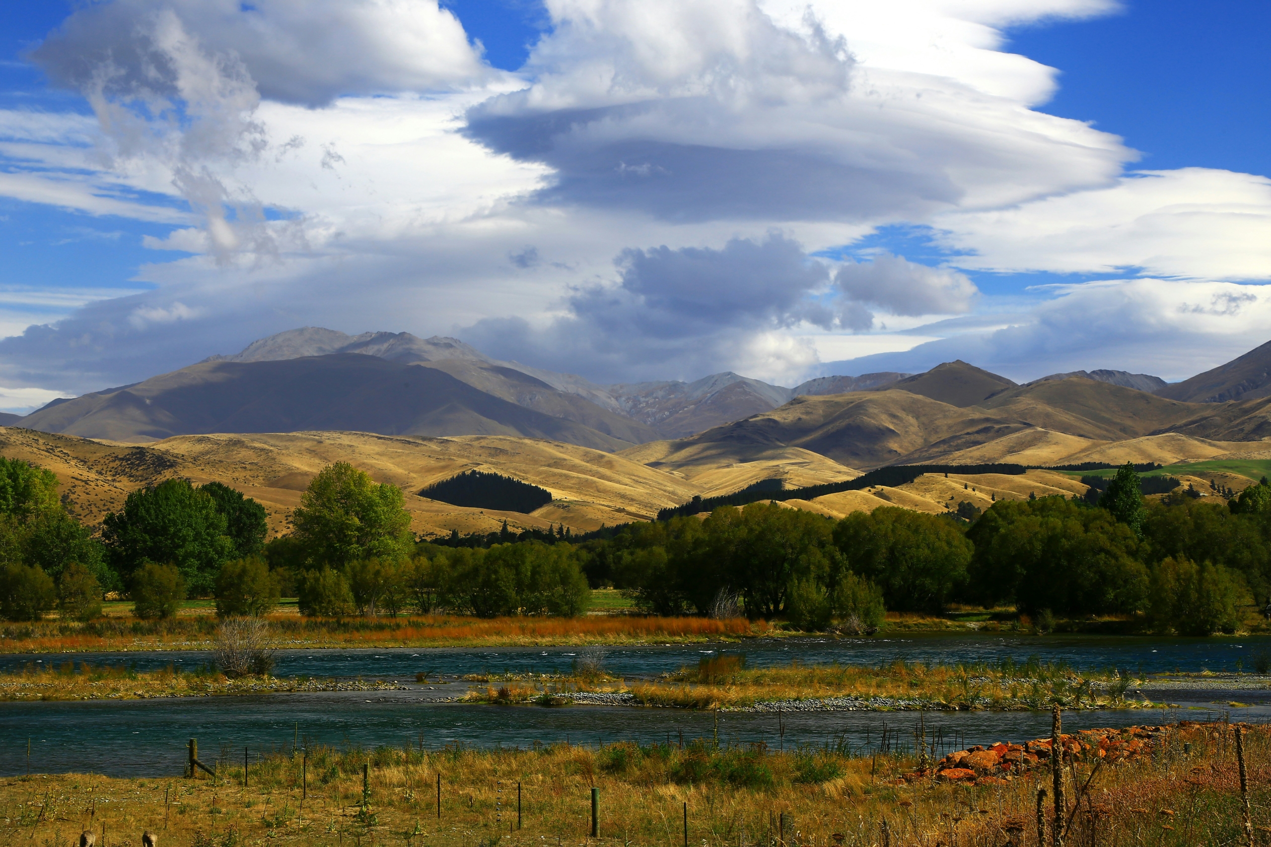 river flowing through farmland