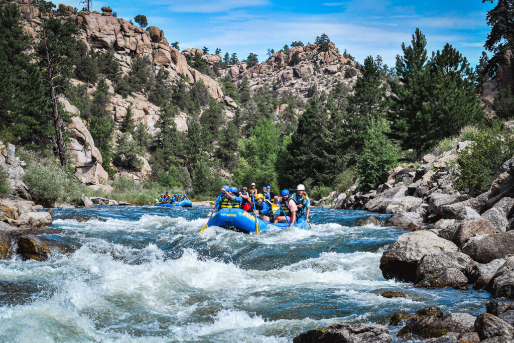 three boats rafting down the Arkansas River Valley