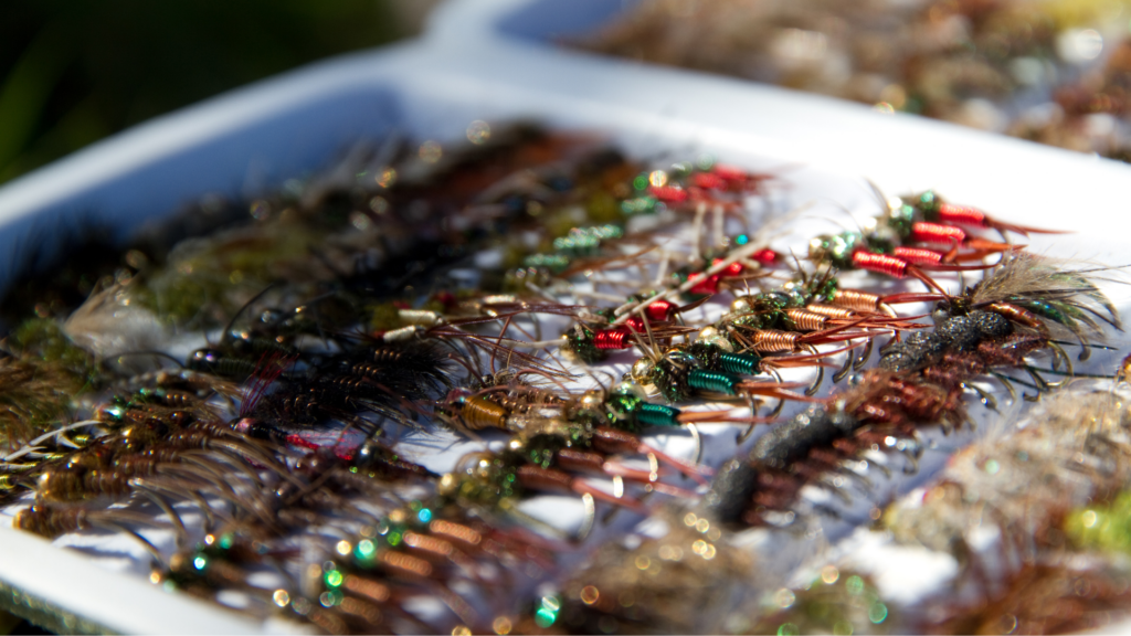 fishing lures and flies in box
