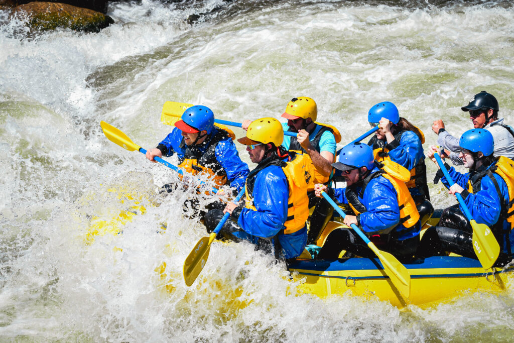 group paddling into more intense whitewater on The Numbers section of the Arkansas River