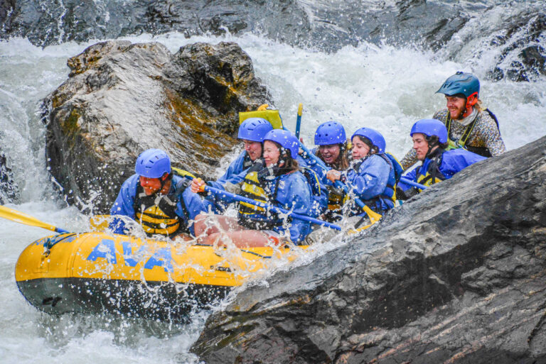 Adventurers on a white water rafting trip.