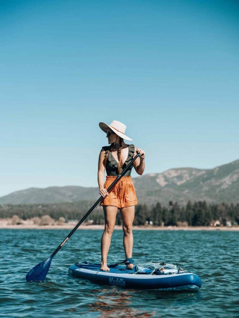 Woman paddling stand up paddleboard