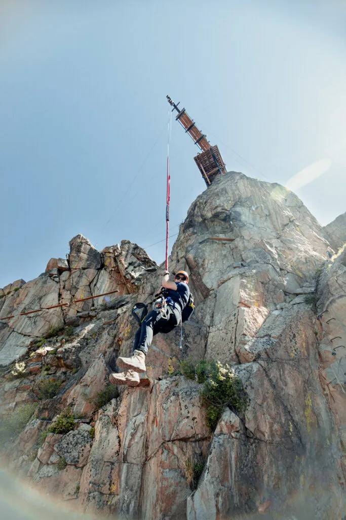 Guest on the 78-foot free fall on AVA's Granite Via Ferrata course.