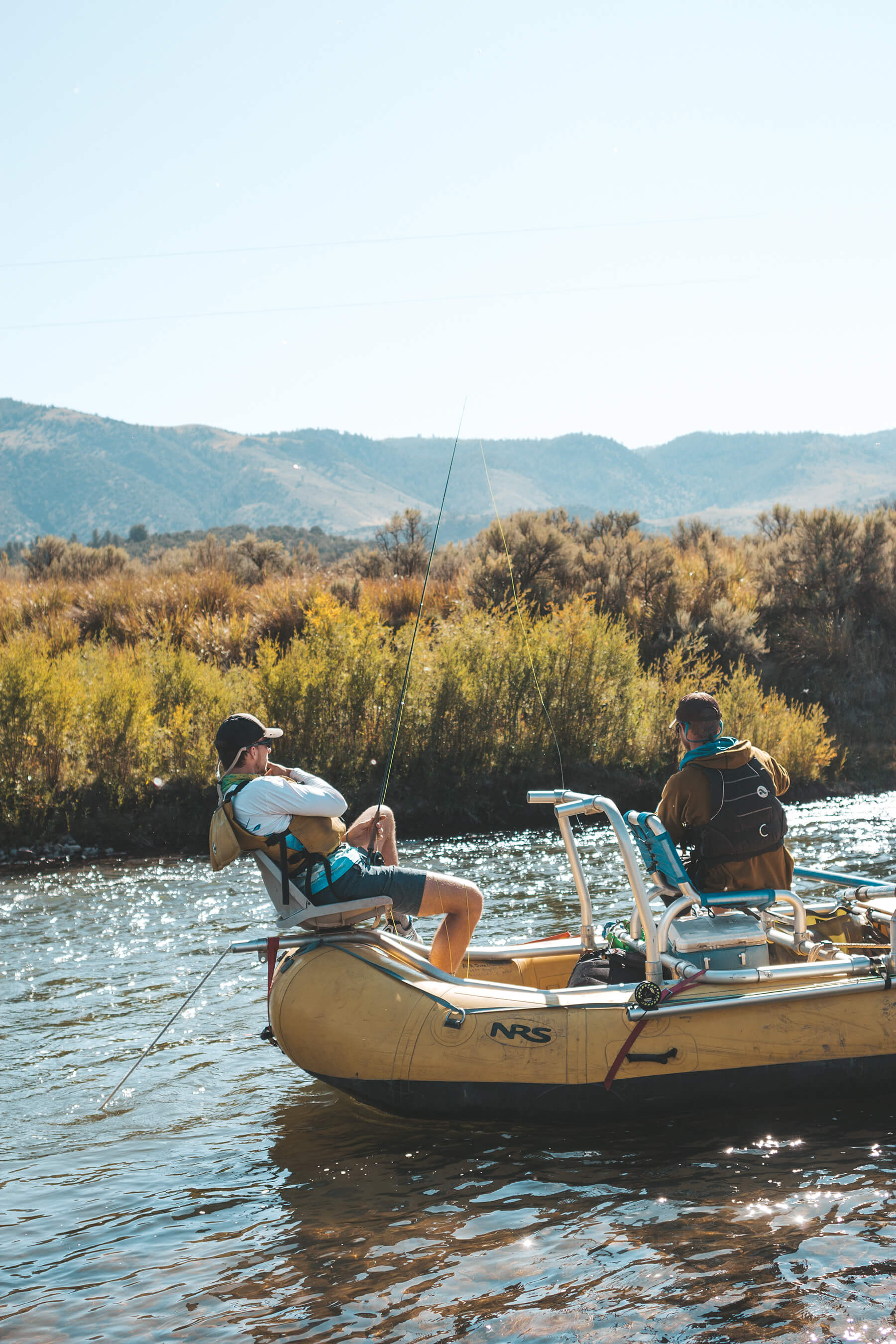 fly fishing two men in boat