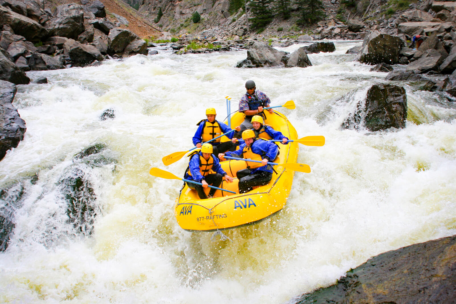 A group of rafters take a steep drown in the Gore Canyon