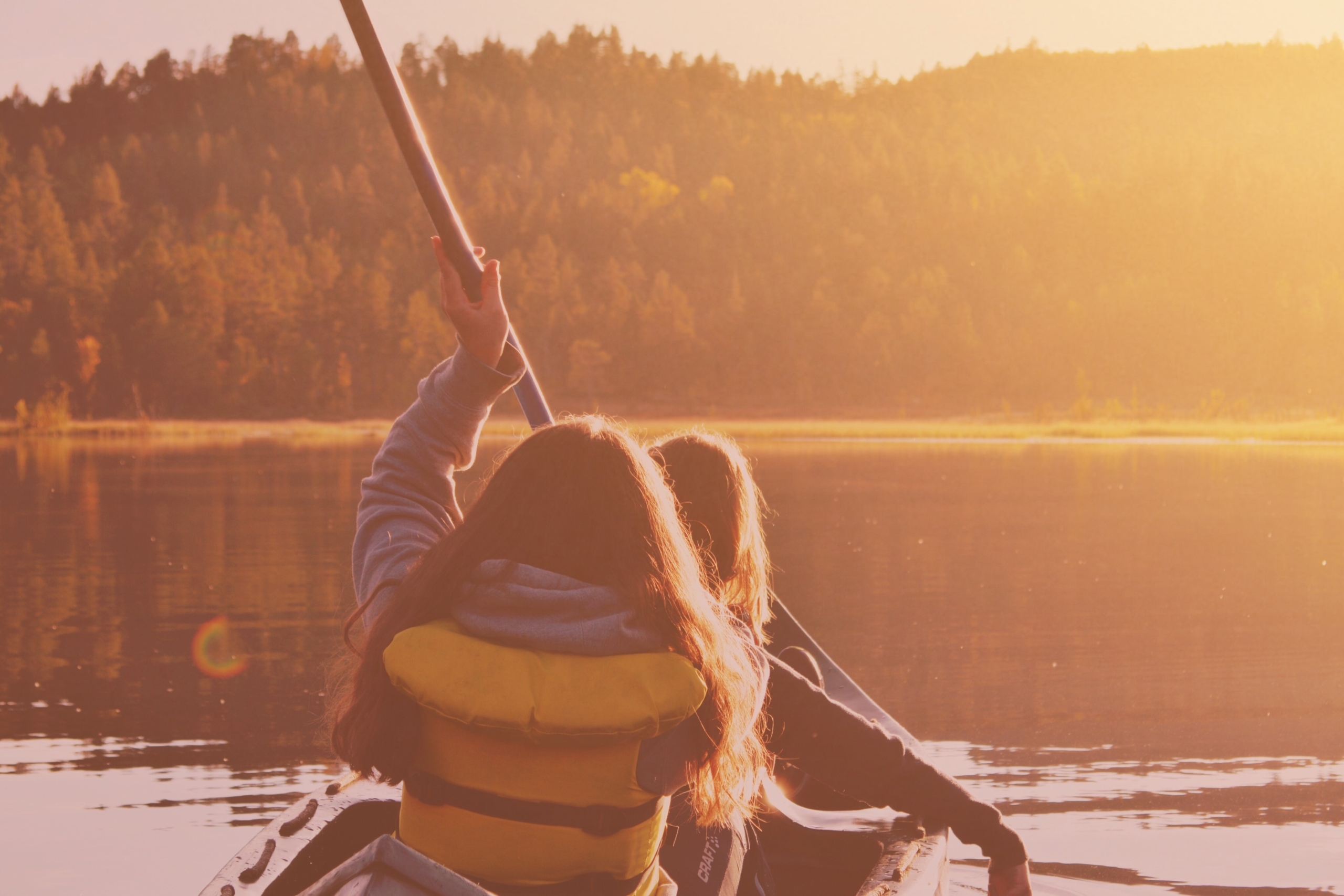 golden hour-2 girls in canoe