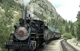Steam locomotive on railroad track