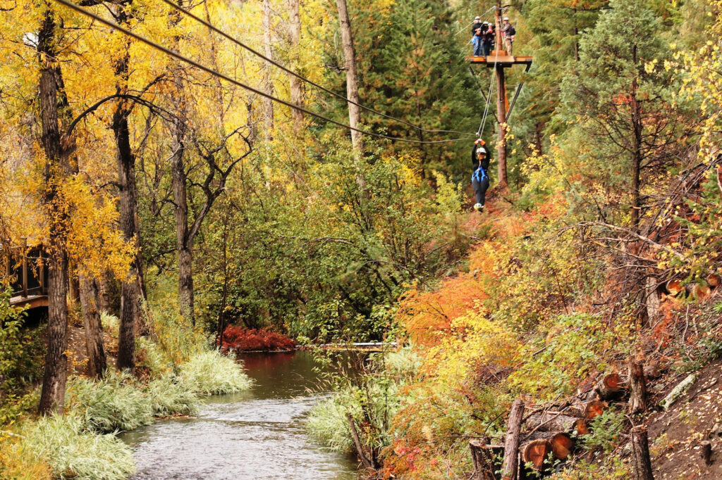 fall ziplining over chicago creek in idaho springs