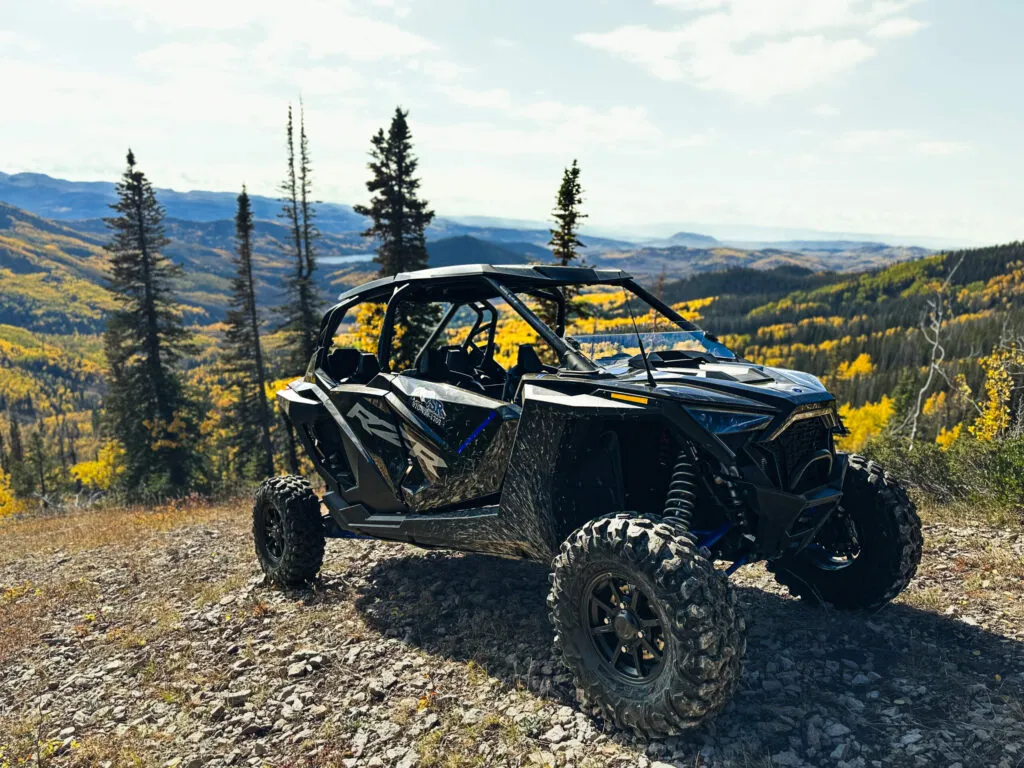 Polaris RZR UTV with Colorado's fall leaves in the background.