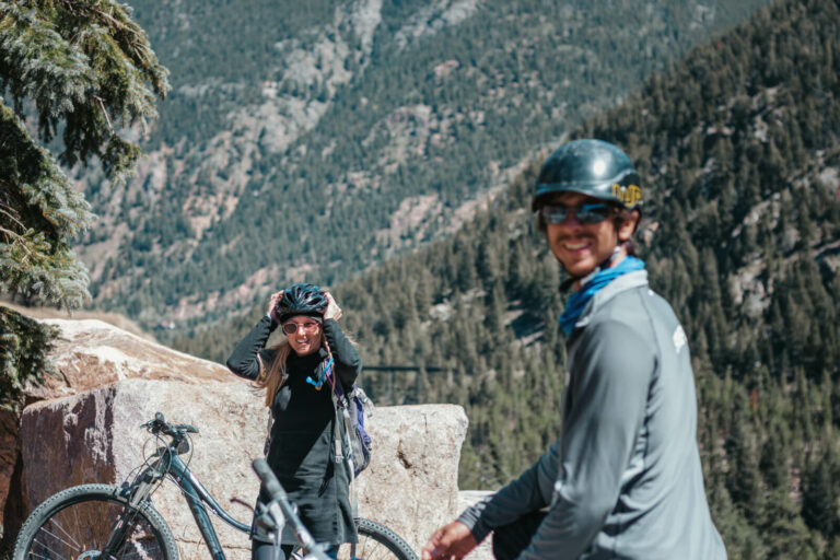 Couple stopping to take in the view on bike adventure.