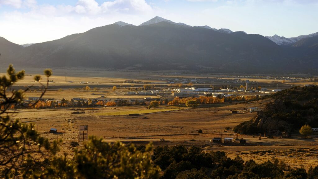 View of Buena Vista mountains from across the town and yellow/orange plains