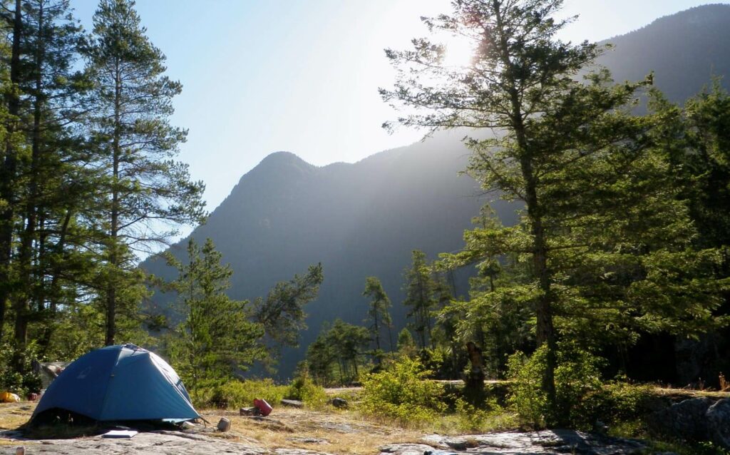 Tent in front of a scenic Colorado mountain backgraound