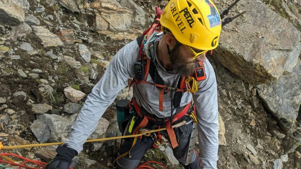 Climbing guide on the mountain.