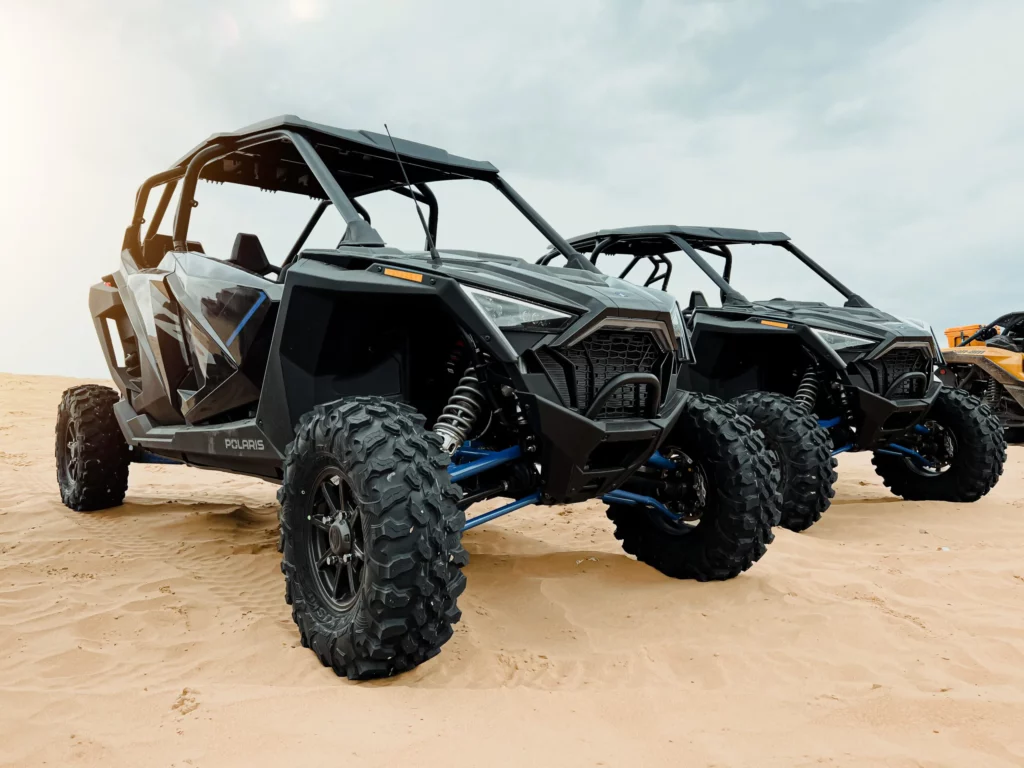 Off-road UTVs ready to cruise the trails.