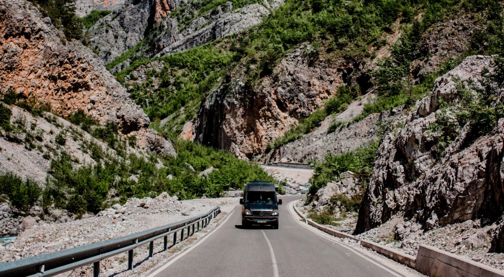 Van on the highway in the Colorado mountains.