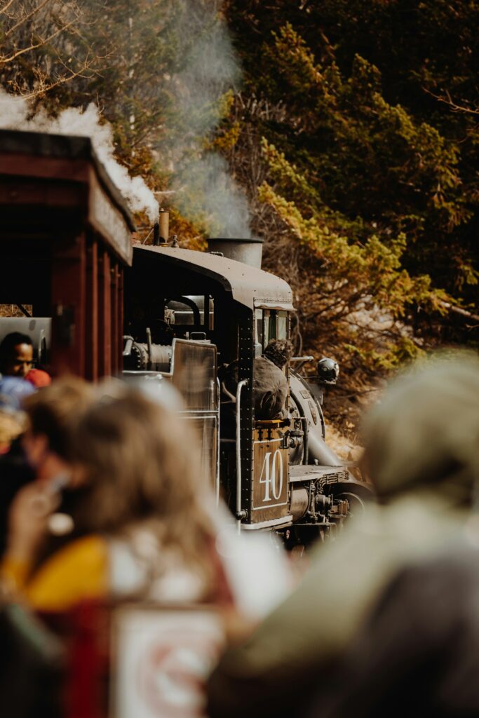 View of the first car in a steam engine from behind.