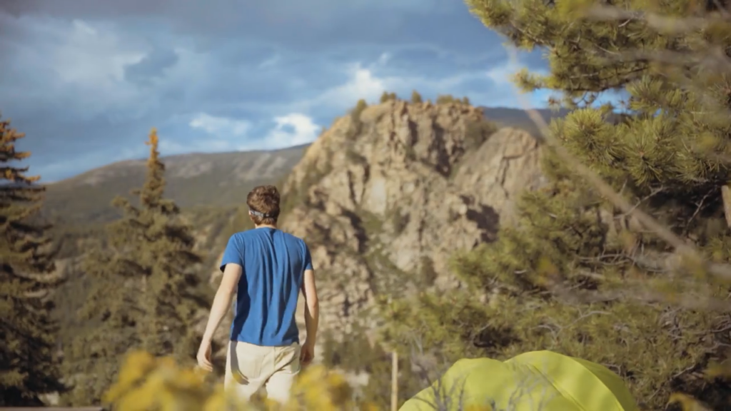 Man looking out over the valley in the Colorado high country.