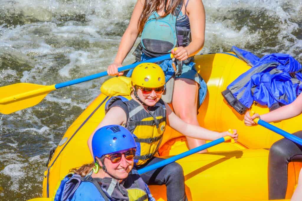 Kid whitewater rafting in Colorado
